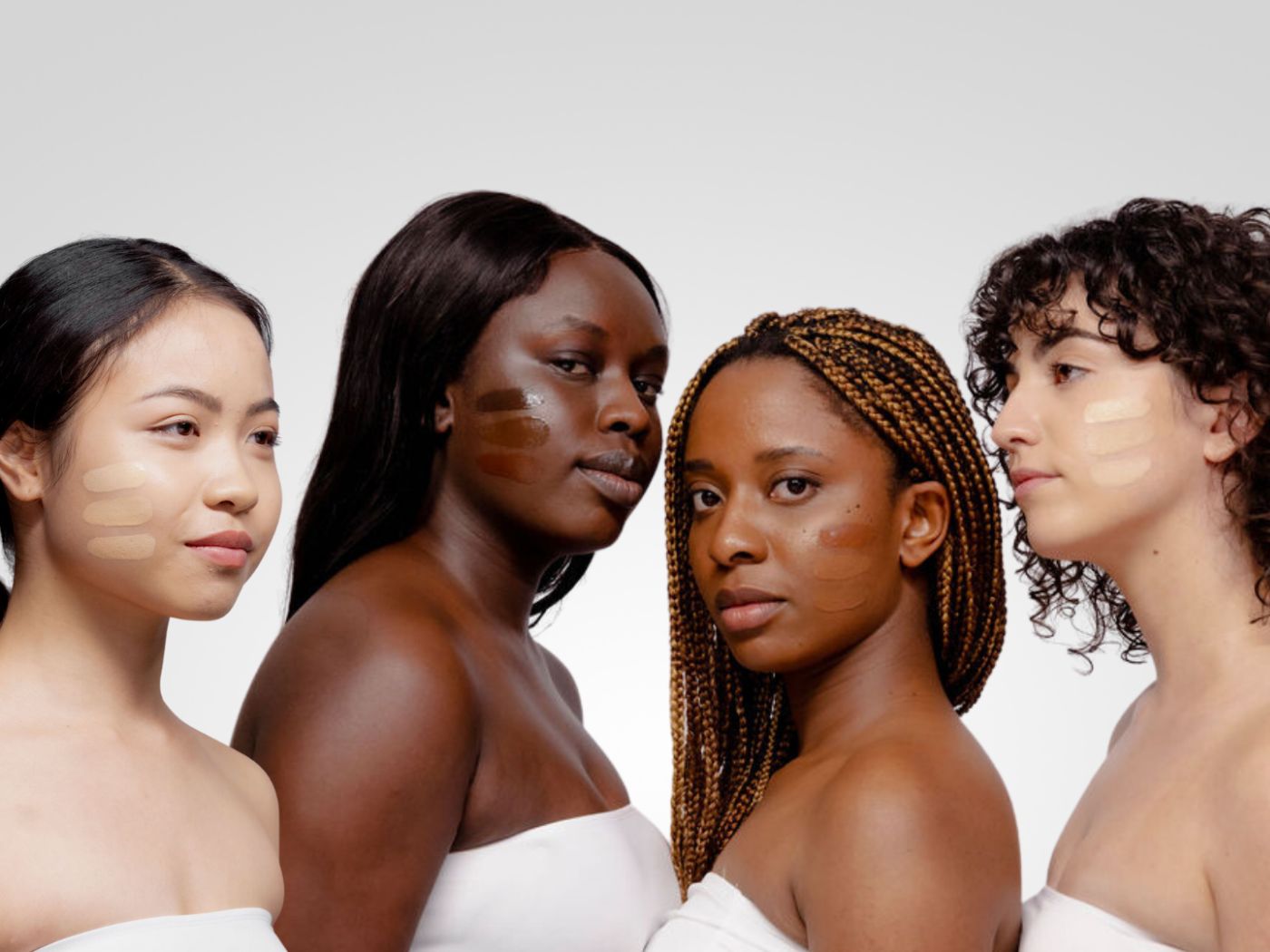 Four women wearing Match My Makeup shades