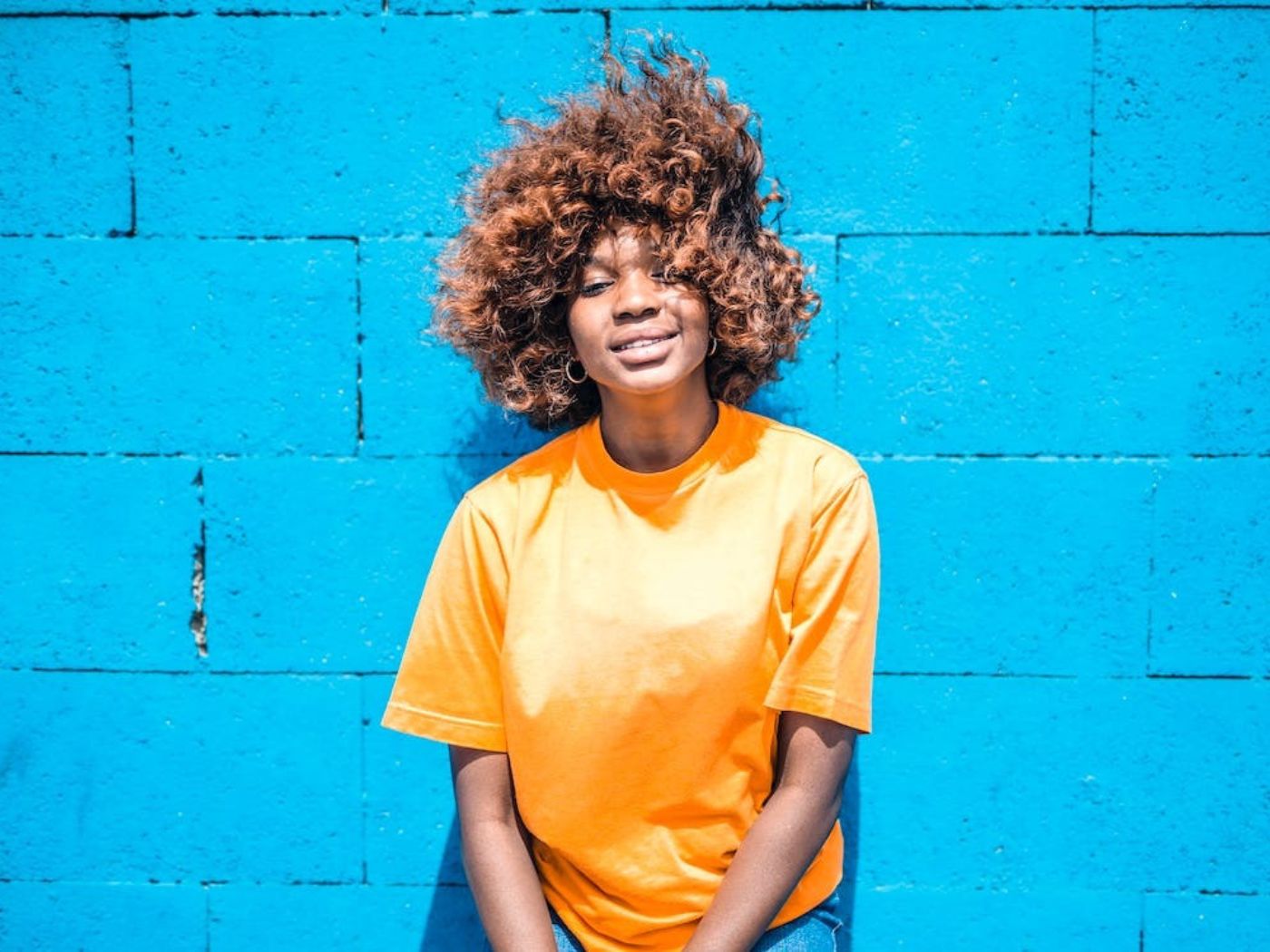 Woman with natural hair blowing in the wind